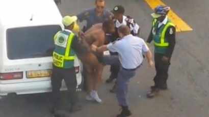 VIDEO: Cops assault naked man